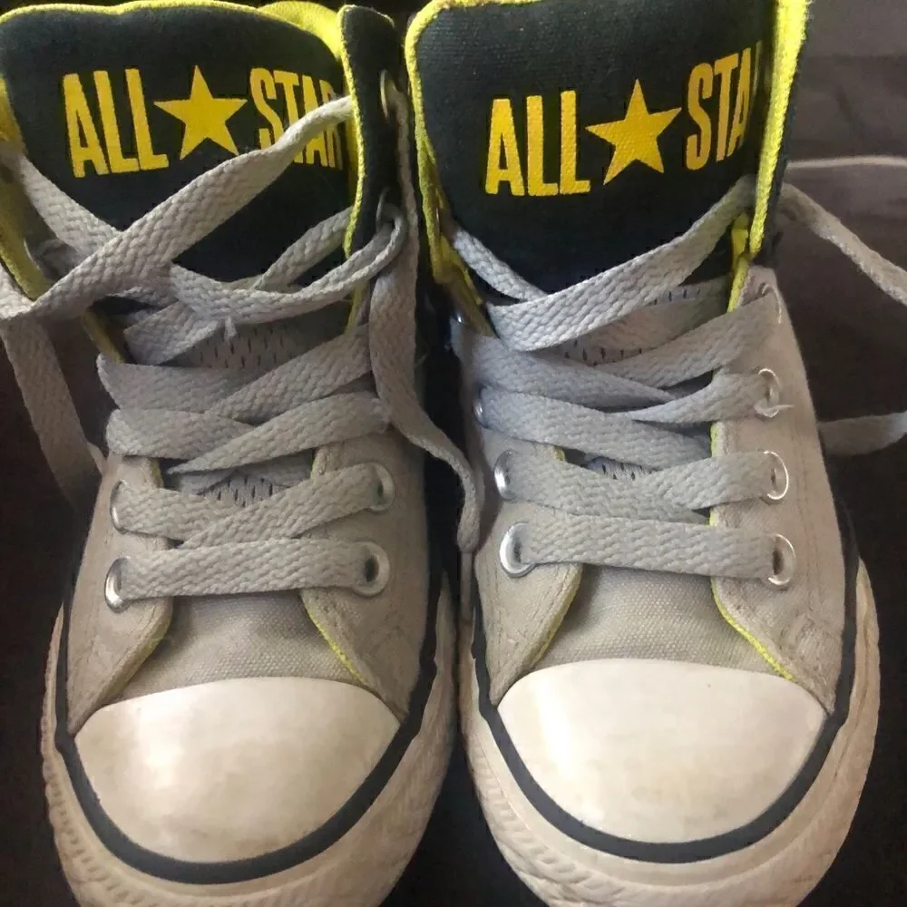 Boys all-star converse sneakers size 1 black and yellow.